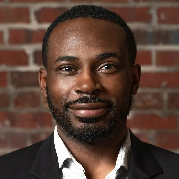 portrait image of a man wearing a smart suit
